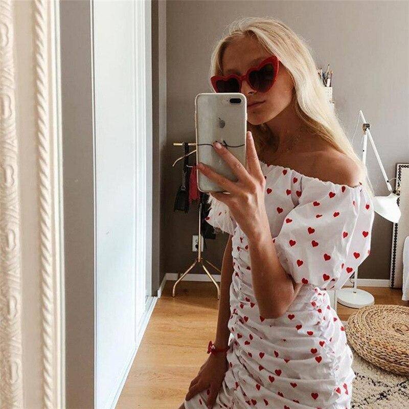 robe blanche courte epaule denudee