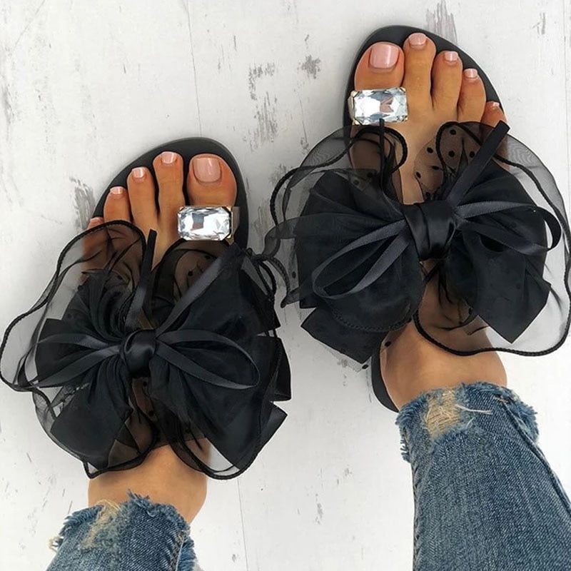 Pantoufles de célébrités de luxe pour femmes, tongs plates avec nœud papillon, chaussures d'intérieur pour dames, grande bague en biscuits, Parker, mignon, pois, sexy 1