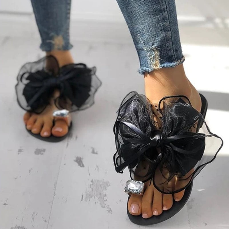 Pantoufles de célébrités de luxe pour femmes, tongs plates avec nœud papillon, chaussures d'intérieur pour dames, grande bague en biscuits, Parker, mignon, pois, sexy 2
