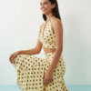 jupes courtes à pois jaune ensemble top dos nu croisé taille haute ourlet mouchoir imprimé élastique