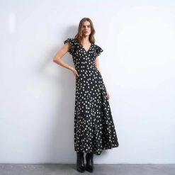 robes pin up noires à pois blanc monochrome manches évasées col v robe midi élégante femme mode soirée