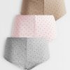 shortys à pois gris et rose maille lot de 3 pointelle porté par un mannequin femme avec un haut beige rayé