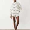 vestes à pois boule oversize motif et survêtement ourlet blanc a pois noirs avec col montant fermeture zippe