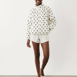 vestes à pois boule oversize motif et survêtement ourlet blanc a pois noirs avec col montant fermeture zippe
