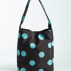 sacs de voyage à pois épaule porté marron foncé avec des grands motifs circulaires bleu turquoise et une longue anse confortable