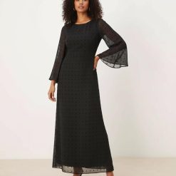 robes à pois années 50 noir floqués en mousseline longue manches ange femme élégante coupe évasée pour soirée