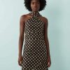 robes asymétriques à pois en tulle courte dos nu motif marron robe à pois noirs et blancs pour femme élégante