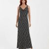 robes évasées à pois bénitier col longue manches sans noir anna dot élégante robe longue sans manches noire à pois blancs idéale pour lété