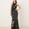 robes à pois années 50 godets longue encolure nageur biais fleurs motif noir avec imprimé floral et pois sur fond sombre