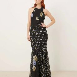 robes à pois années 50 godets longue encolure nageur biais fleurs motif noir avec imprimé floral et pois sur fond sombre