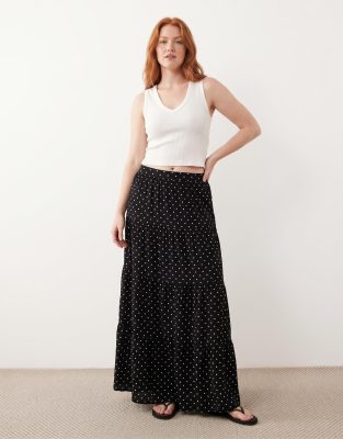 jupes longues à pois et volants étagés femme- jupe longue noire fluide imprimée de petits pois blancs avec volants superposés