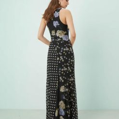 robes à pois années 50 godets longue encolure nageur biais fleurs motif noire imprimé floral et pois vue de dos