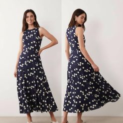 robes a pois bleu marine longue godets dos nageur jupe sans manches evasee avec imprime pois creme vue de face et de dos