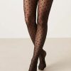 collants à pois design noir femme fantaisie motif tendance voile fin transparent imprime petits pois noirs sur les jambes