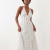 robes longues marron à pois multicolore dos nu tulle volants longue blanche à pois noirs col halter avec des détails froncés sur le buste et des volants légers parfait pour lété