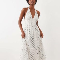 robes longues marron à pois multicolore dos nu tulle volants longue blanche à pois noirs col halter avec des détails froncés sur le buste et des volants légers parfait pour lété