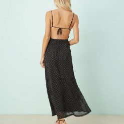 robes en tulle à pois mi longue noir et blanc vue de dos avec un dos nu a bretelles fines