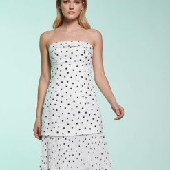 robes à pois transparentes bandeau plissée longue exclusivité petite blanc avec des pois noirs et une jupe plissée