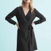 robes portefeuille à pois lin en robe noir à manches longues nouée à la taille