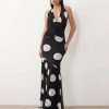robes longues noires à pois corset style cintrée taille sirène ourlet dos nu encolure plongeante fluide pour femme