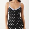 robes à pois chics longue caraco en tulle bleu noire a pois blancs avec bretelles fines