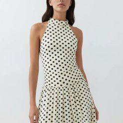robes à pois jaune col montant taille basse citron et marron une robe élégante avec un motif à pois noire sur fond crème sans manche parfait pour lété