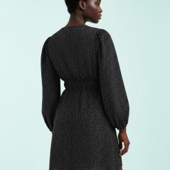 robes longues noires à pois en velours côtelé courte robe noire à pois blancs manches longues bouffantes modèle féminin