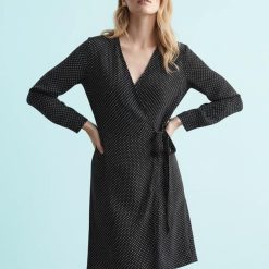 robes portefeuille à pois lin en robe noir à manches longues nouée à la taille