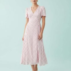 robes évasées à pois manches courtes col v rose élégante robe rose avec des pois noirs pour un look estival et décontracté trouve la tienne