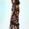 robes longues noires à pois fleurs basque imprimé taille élastiquée dos nu manches courtes volantées motif floral et volant à pois avec liseré rouge