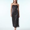 robes longues noires à pois en dentelle bords satin bretelles fines fente laterale style nuisette