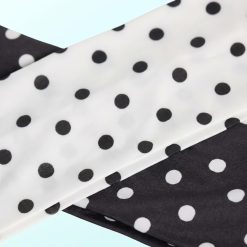 bandeaux à pois monochrome lot de 2 en noir blanc en tissu doux croisés montrant le motif inversé sur fond clair