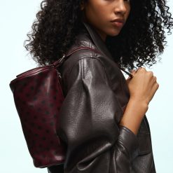 sacs à main à pois polochon bordeaux avec des anses en cuir noir pour femme