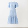 robes à pois jaune bleu clair avec manches bouffantes basse taille robe midi a pois blancs col rond avec volant au bas