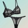 brassières à pois scintillants tulle non rembourrés bonnets noir et string assorti en dentelle transparente sur fond pastel