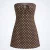 robes longues marron à pois bandeau avec liens noués sans bretelles coupe évasée motif pois crème